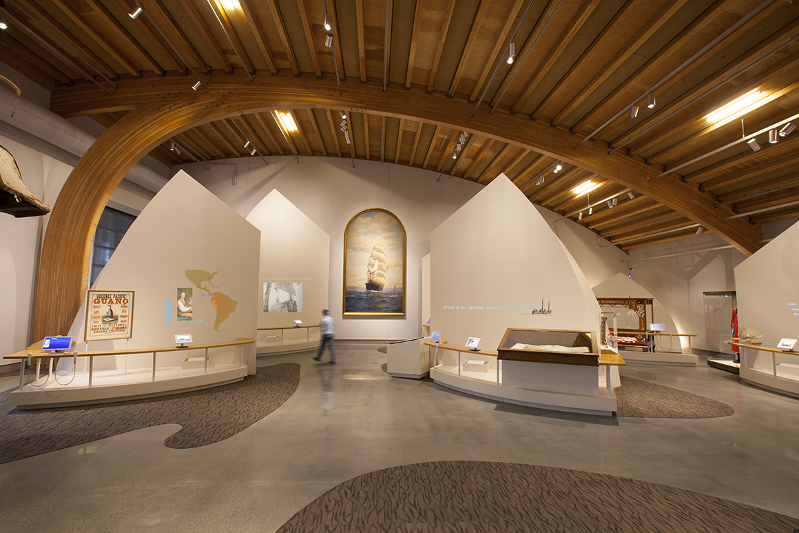 The abstract sail forms visually interpret and unify the theme for the “Sea Change” exhibit for the Mystic Seaport Museum.