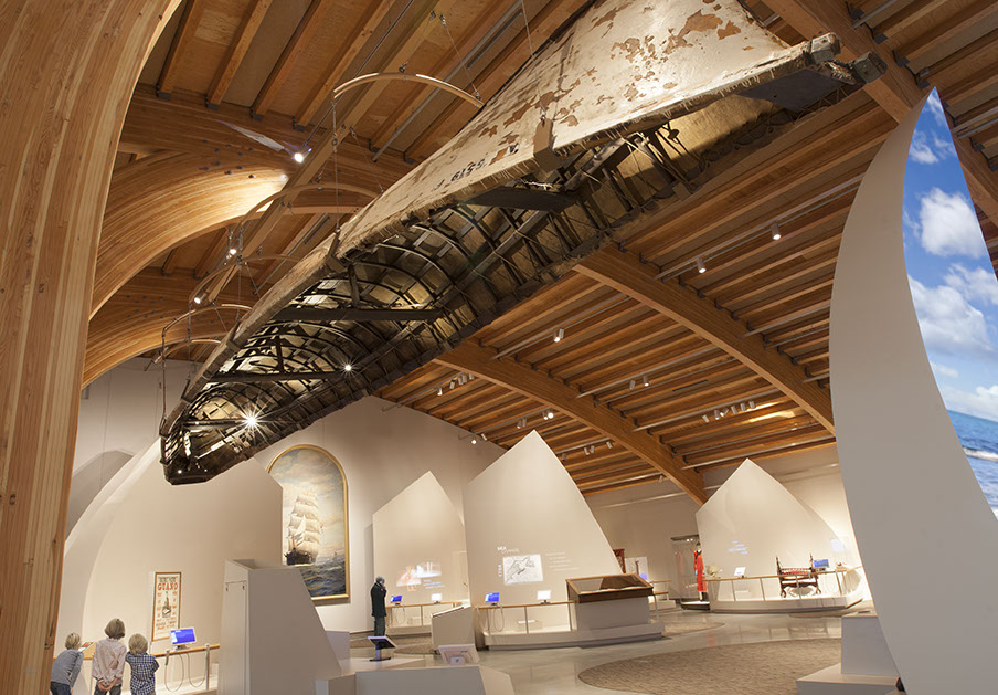 To relate to the gallery height, McMillan Group flew the 30’ Arctic umiak boat, creating an unusual display feature. 