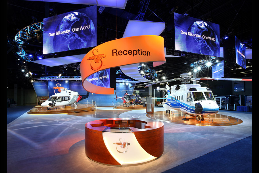 We developed the "One Sikorsky, One World" theme expressed throughout the Sikorsky exhibit to communicate their global breadth and depth.